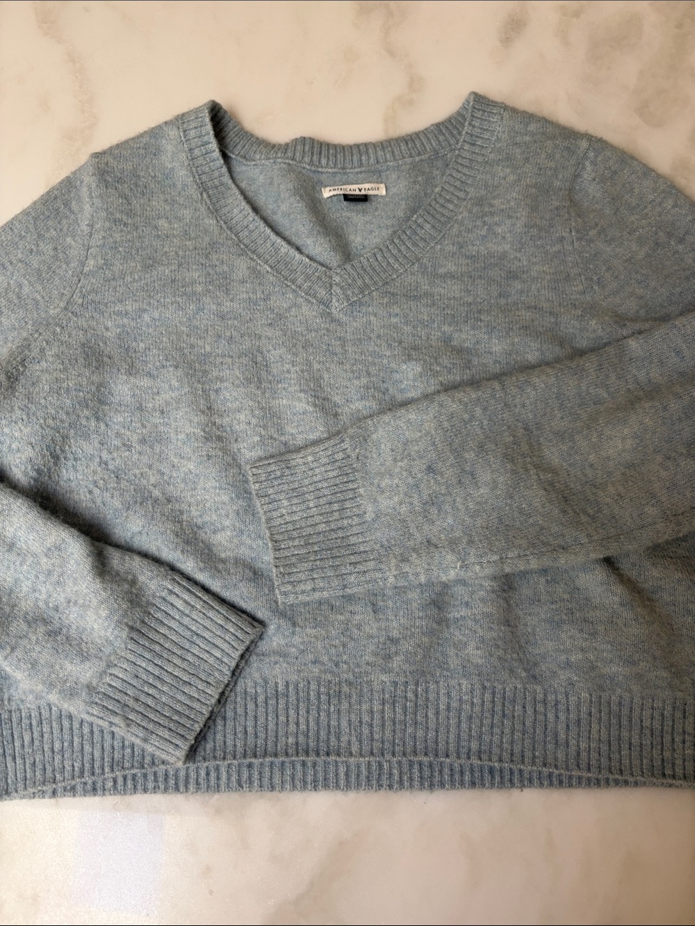 American eagle women’s cropped blue sweater